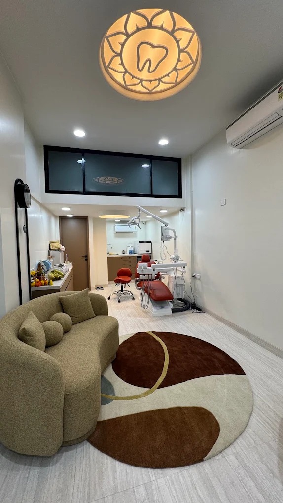 Dantved Clinic interior — lounge and treatment area with signature ceiling lamp